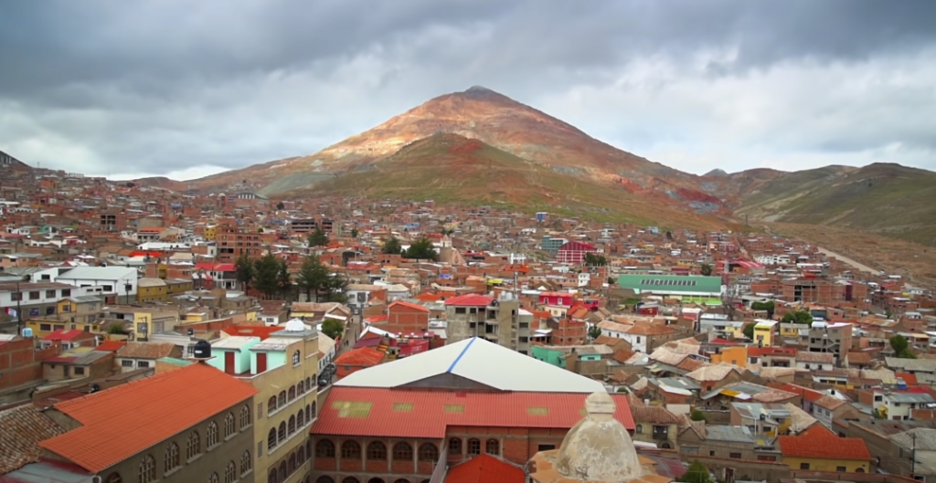 Top view of the entire city with mountains and skies visible in the background