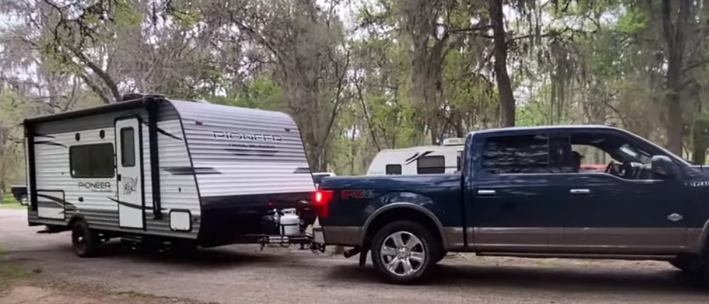 Trailer with trees in the background